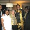 Deputy Speaker Larry Turner’s granddaughter, Raven, with legislative intern Hasan Osman, Maxine A. Smith, Roland Martin and Barbara Coger
